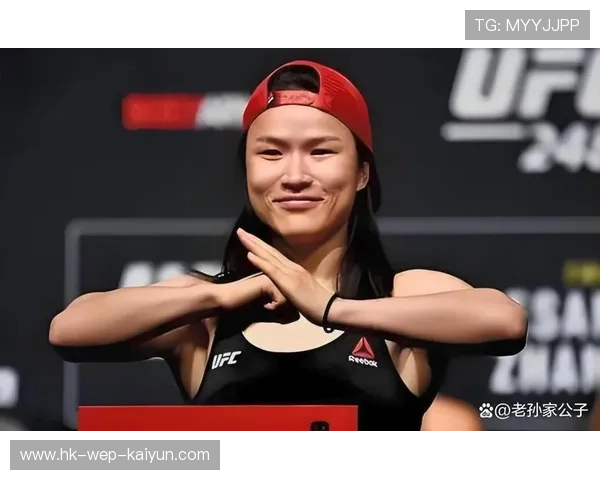 UFC冠军战,张伟丽强势击倒对手再创历史,ufc张伟丽冠军战视频